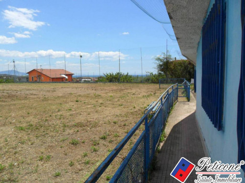 LOCALI DEPOSITO con TERRENO da adibire a CAMPO DA CALCIO/TENNIS