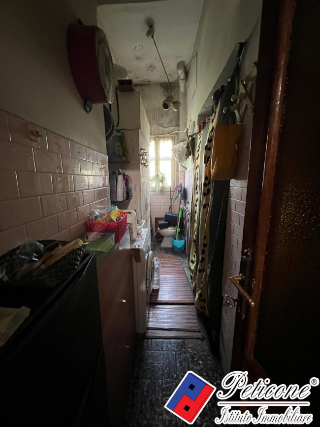 APPARTAMENTO 1°PIANO CON CANTINA, SITUATO IN PIENO CENTRO