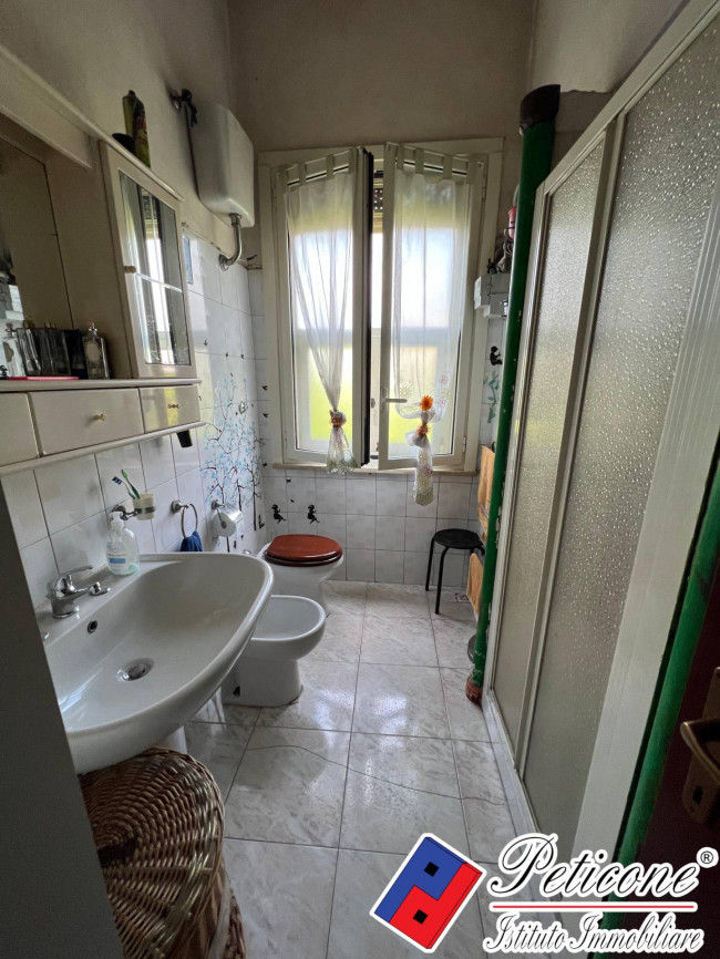 APPARTAMENTO 1°PIANO CON CANTINA, SITUATO IN PIENO CENTRO