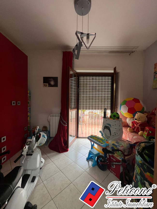 APPARTAMENTO con TERRAZZO ESCLUSIVO E GARAGE