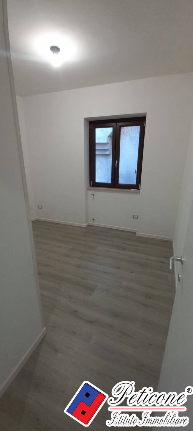 Appartamento Ristrutturato con Corte Comune