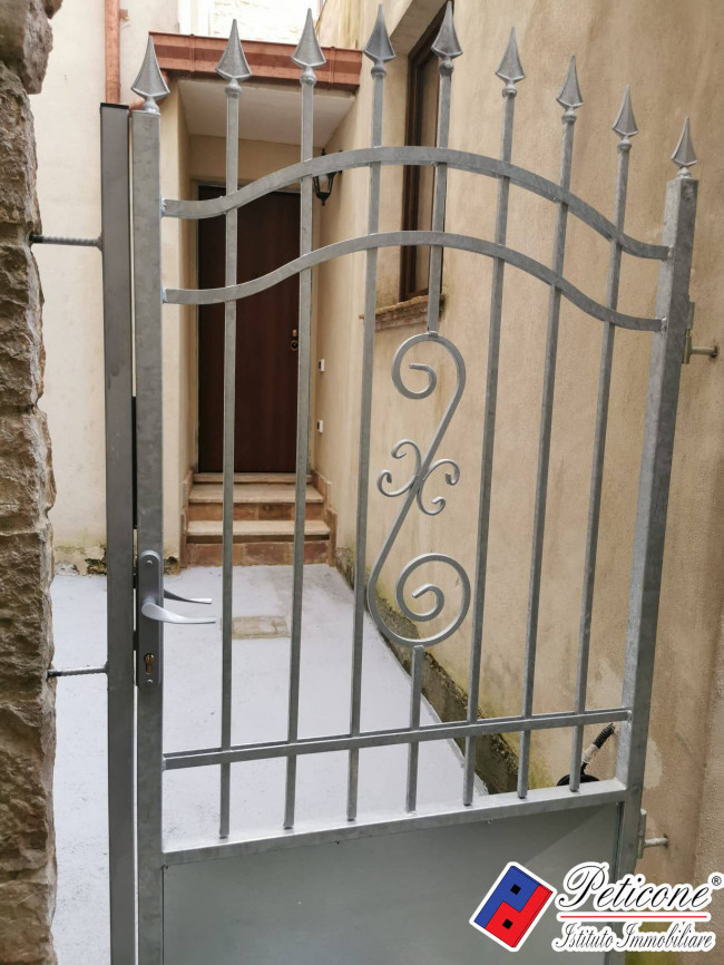Appartamento Ristrutturato con Corte Comune
