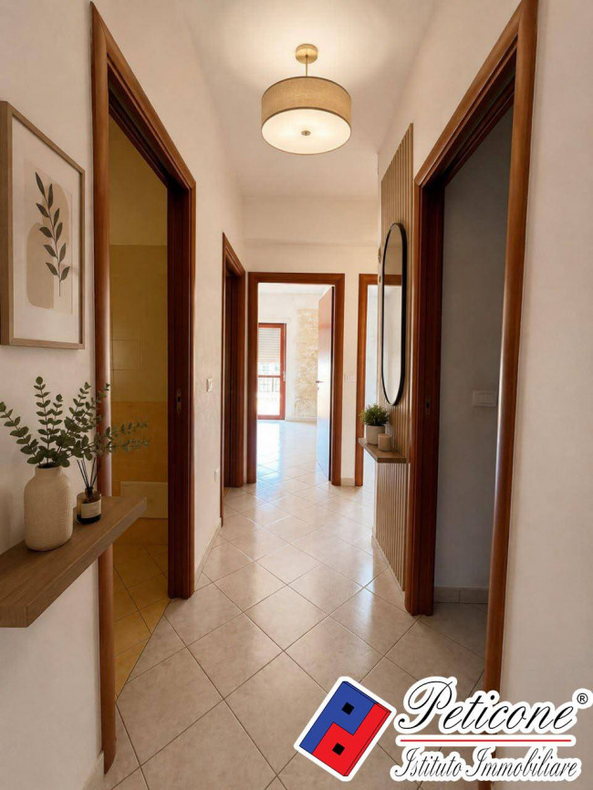 APPARTAMENTO con TERRAZZO ESCLUSIVO E GARAGE