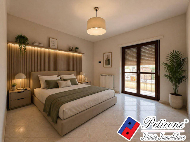 APPARTAMENTO con TERRAZZO ESCLUSIVO E GARAGE