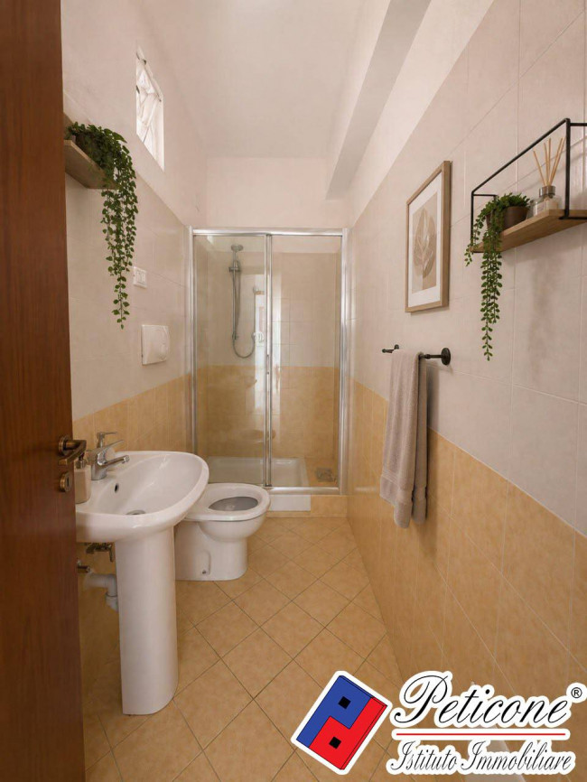 APPARTAMENTO con TERRAZZO ESCLUSIVO E GARAGE