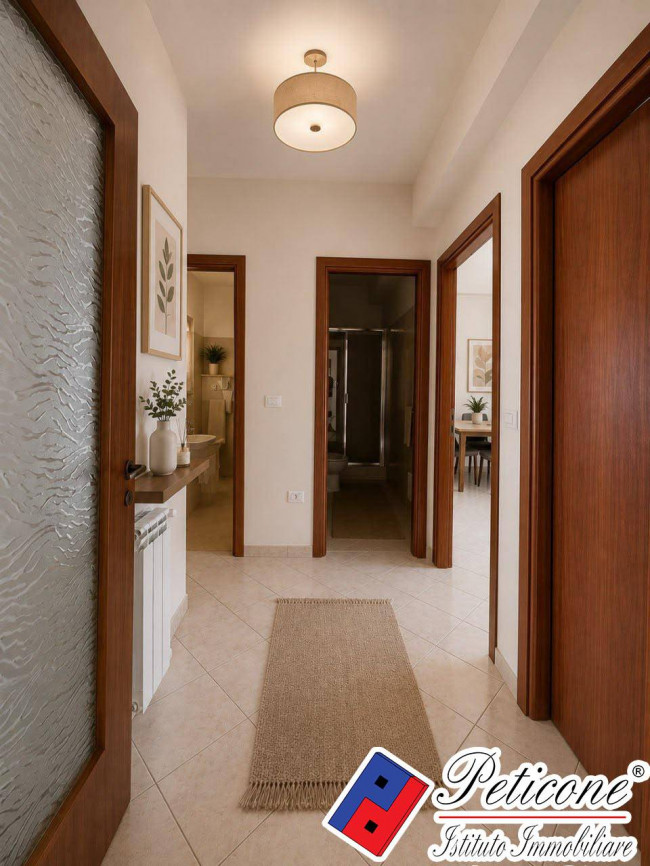 APPARTAMENTO con TERRAZZO ESCLUSIVO E GARAGE